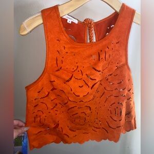 OndadeMar Bold and striking orange velour cut out sleeveless blouse.